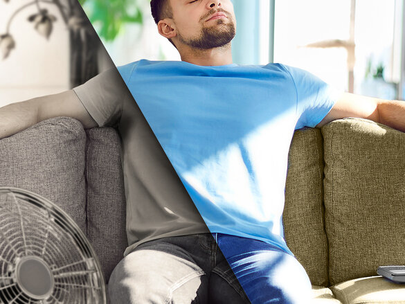 Young man relaxing on couch enjoying fresh air of comfortable indoor climate